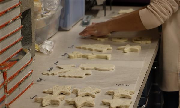 Various salt dough ornaments on shelf